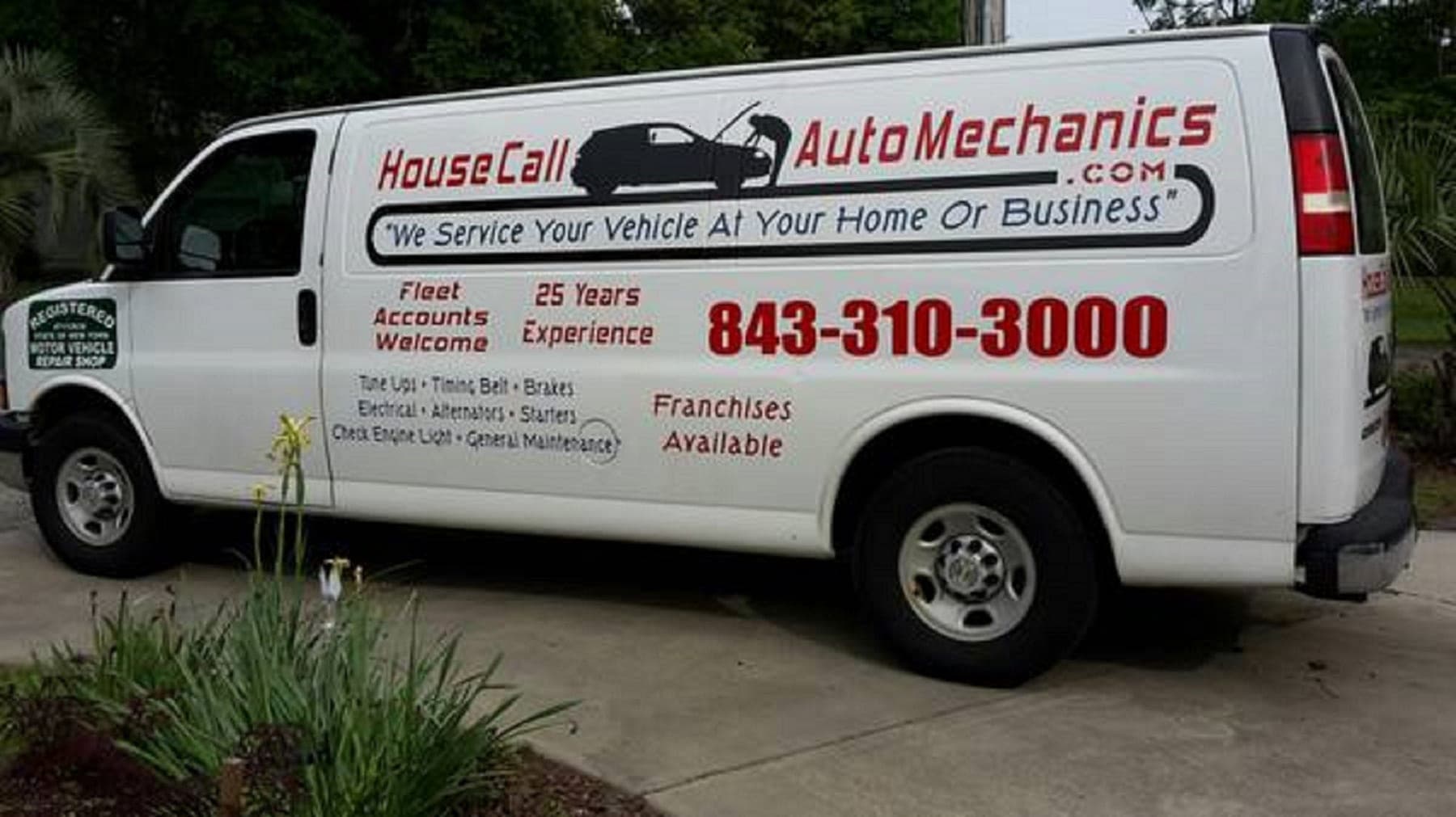 Kevin's white Housecall Auto Mechanics service van, lettered with 843-310-3000